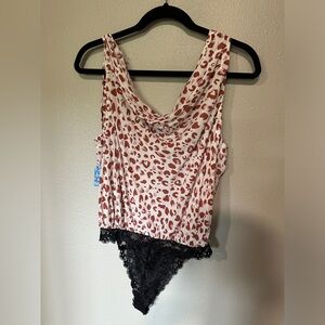 Free people cheetah print body suit! Never worn!!